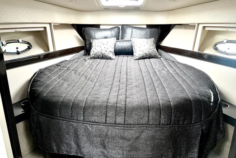 Slide: The Image of Luxurious interior of 2016 Formula 37 Performance Cruiser with elegant bedding and porthole windows. - 8