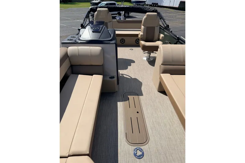 Slide: The Image of 2027 Veranda VR265VLC boat interior with beige seating and modern design. - 12