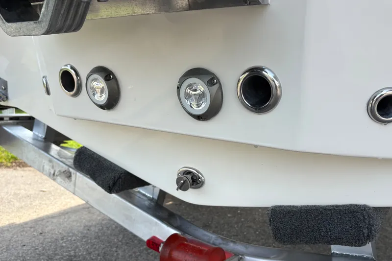 Slide: The Image of Close-up of 2027 Pioneer 220 Bay Sport boat's rear fittings and lights. - 9