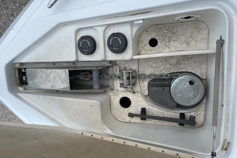 Slide: The Image of Anchor locker of a 2004 Formula 34 Performance Cruiser with chain and windlass. - 24