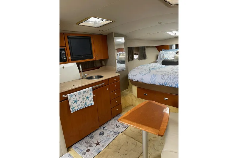 Slide: The Image of Interior of 2004 Formula 34 Performance Cruiser with kitchenette and cozy sleeping area. - 19