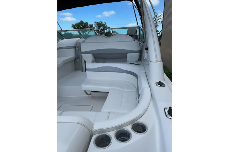 Slide: The Image of 2004 Formula 34 Performance Cruiser interior with white seating and cup holders. - 16