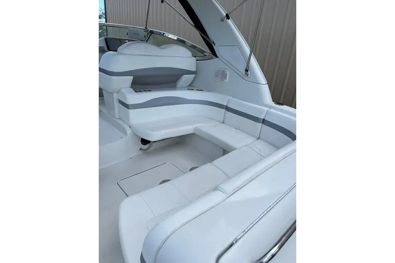 Slide: The Image of 2004 Formula 34 Performance Cruiser interior with white and gray seating. - 15