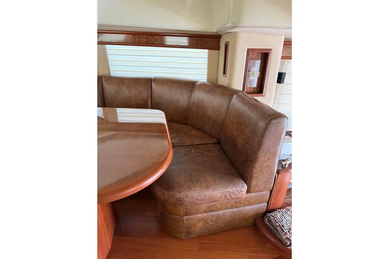 Slide: The Image of Luxurious leather seating in 2008 Silverton 52 Ovation yacht interior. - 8