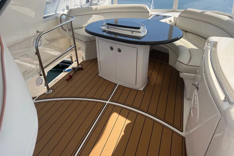 Slide: The Image of Luxurious 2008 Silverton 52 Ovation yacht interior with elegant seating and polished table. - 4