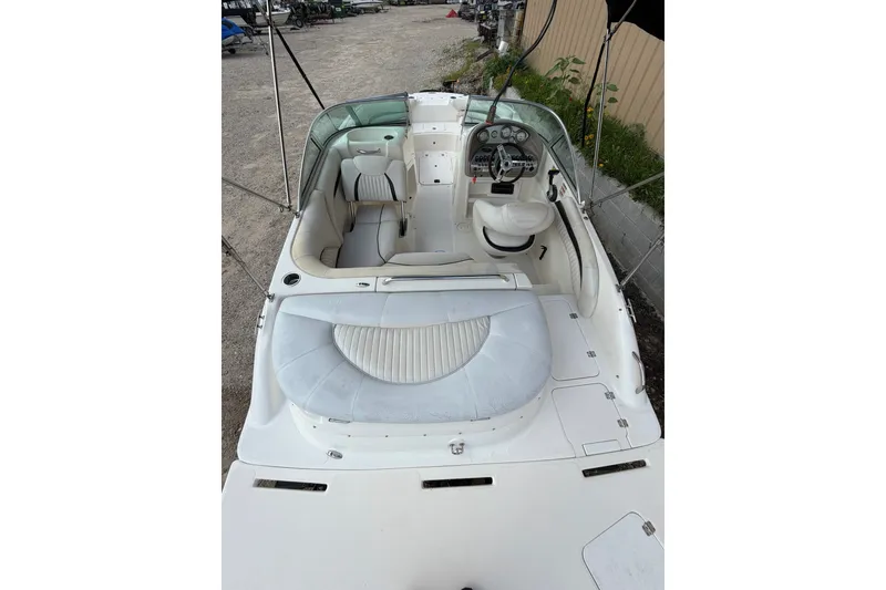 Slide: The Image of 2009 Mastercraft X-45 boat interior with white seating and dashboard view. - 17