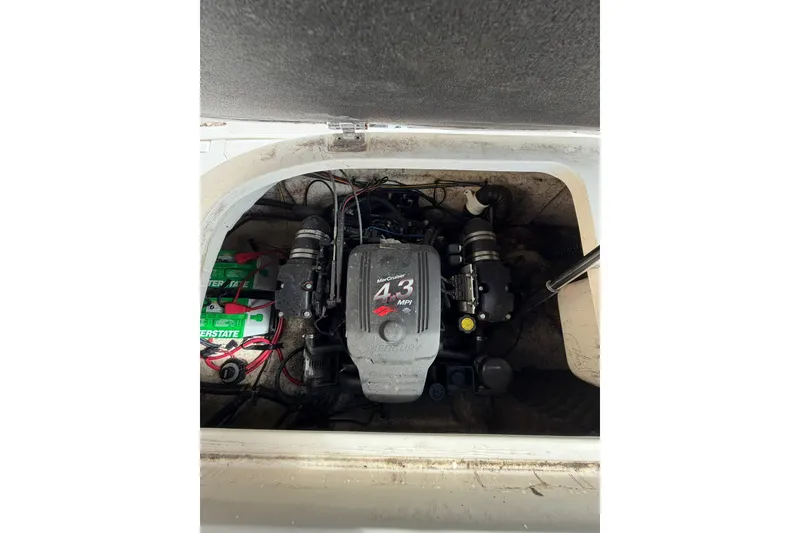 Slide: The Image of 2009 Mastercraft X-45 engine compartment with MerCruiser 4.3 MPI engine and Interstate batteries. - 19