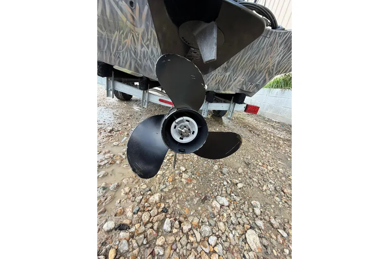 Slide: The Image of 2024 Alweld 1856 Invader boat propeller on rocky ground. - 20