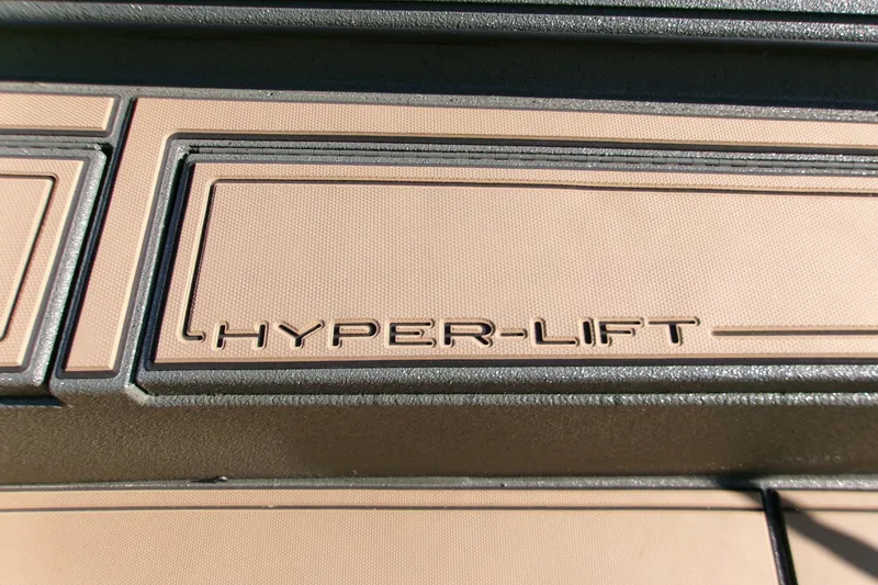 Slide: The Image of 2027 Xpress X18DB Hyper-Lift logo on textured surface. - 8