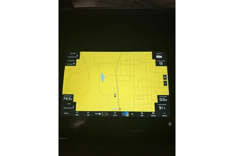 Slide: The Image of Dashboard display of 2023 Cobalt R4 Surf with navigation map and metrics. - 13