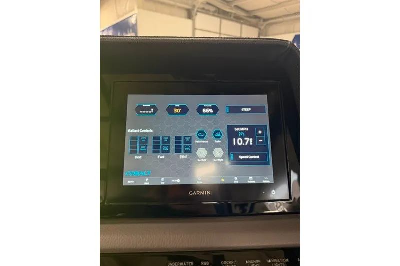 Slide: The Image of 2023 Cobalt R4 Surf boat touchscreen display showing ballast and speed controls. - 14