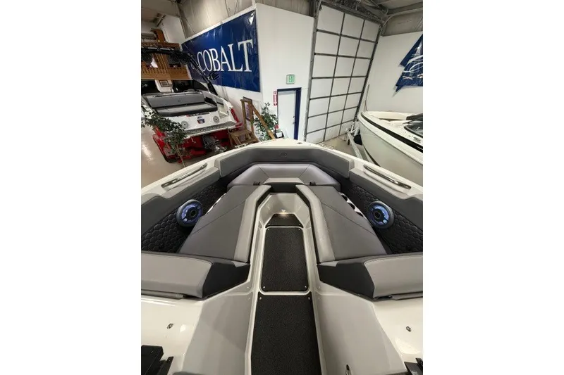 Slide: The Image of 2023 Cobalt R4 Surf boat interior with sleek seating and modern design. - 10