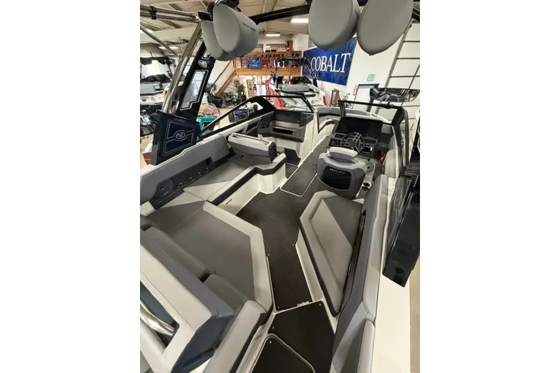 Slide: The Image of 2023 Cobalt R4 Surf boat interior with modern seating and sleek design. - 23