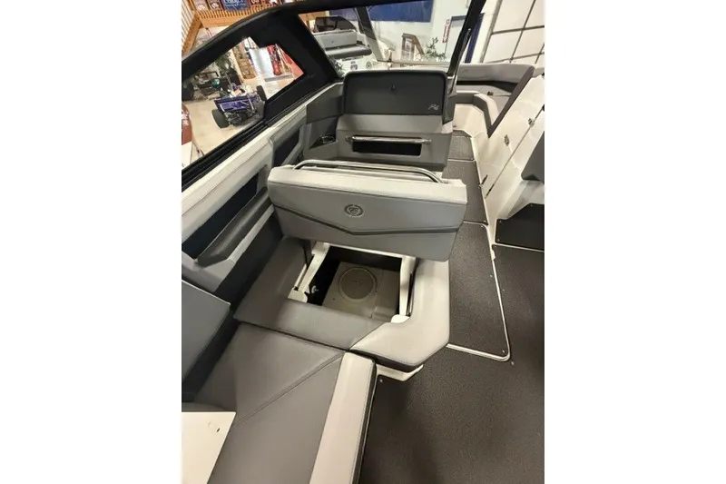 Slide: The Image of 2023 Cobalt R4 Surf boat interior with sleek gray seating and modern design. - 19