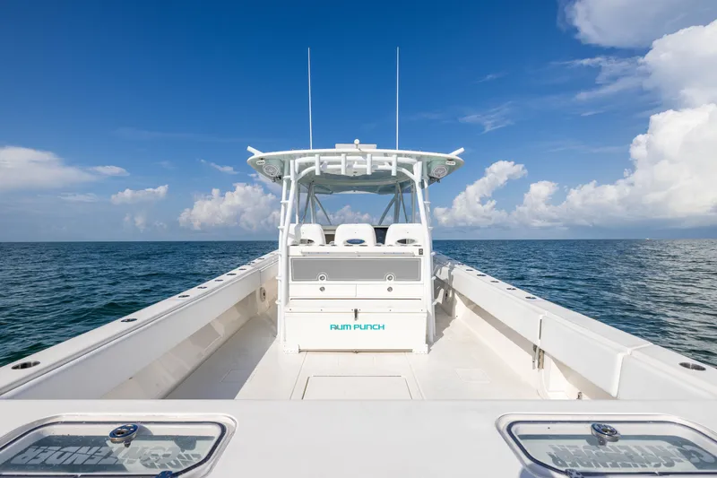 Slide: The Image of 2020 Contender 44 Fisharound boat on open sea under clear blue sky. - 32