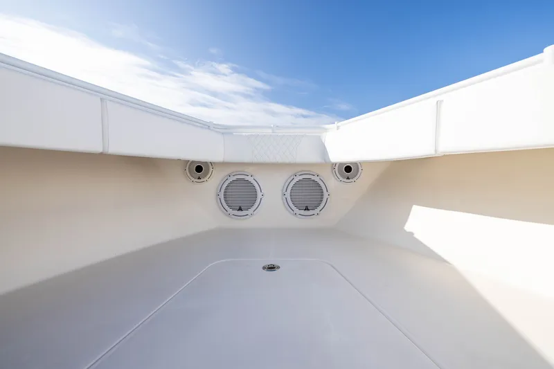 Slide: The Image of Interior view of 2020 Contender 44 Fisharound boat with speakers and clear sky. - 15