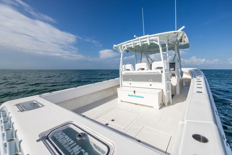 Slide: The Image of 2020 Contender 44 Fisharound boat on open sea under clear blue sky. - 33