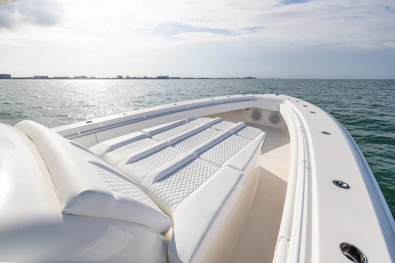 Slide: The Image of 2020 Contender 44 Fisharound boat with luxurious seating on open water. - 13