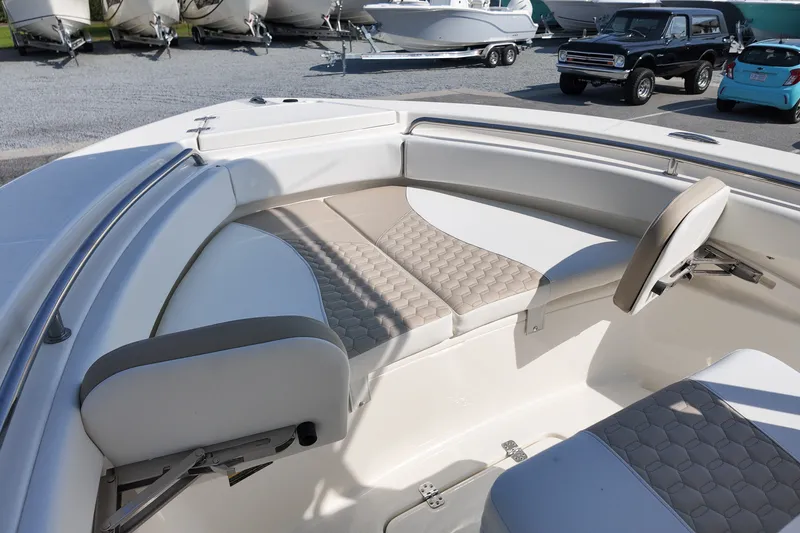 Slide: The Image of 2027 Bulls Bay 200 Center Console boat interior with cushioned seating and sleek design. - 11