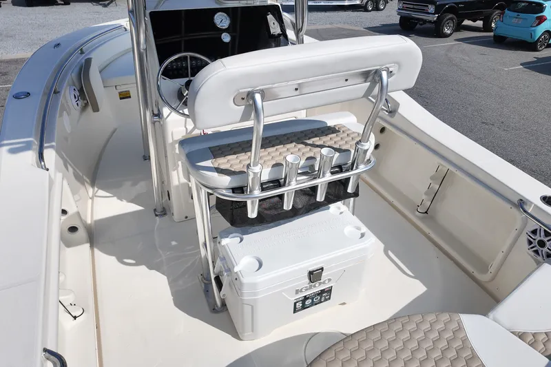 Slide: The Image of 2027 Bulls Bay 200 Center Console boat interior with seating and cooler. - 5