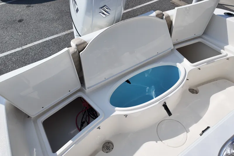 Slide: The Image of 2027 Bulls Bay 200 Center Console boat with open storage compartments and livewell. - 7