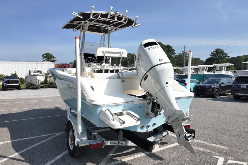 Slide: The Image of 2027 Bulls Bay 200 Center Console boat with outboard motor on trailer. - 2