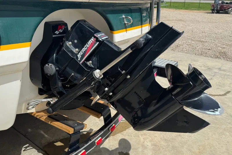 Slide: The Image of Rear view of a 2000 Chaparral 216 SSi boat with Mercury outboard motor. - 23