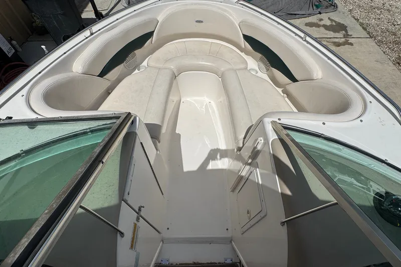 Slide: The Image of Interior view of a 2000 Chaparral 216 SSi boat with spacious seating. - 13