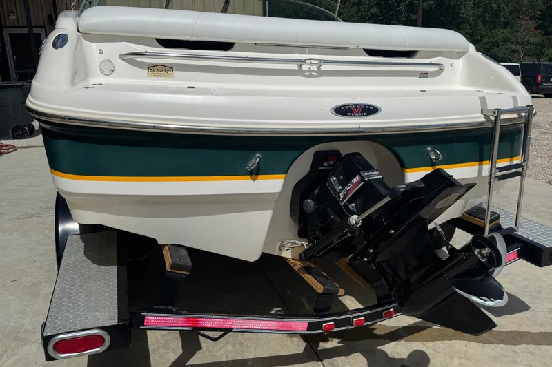Slide: The Image of Rear view of a 2000 Chaparral 216 SSi boat on a trailer. - 24