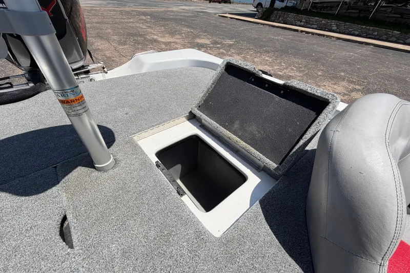 Slide: The Image of Open storage compartment on 2008 Skeeter SX190 boat deck. - 41