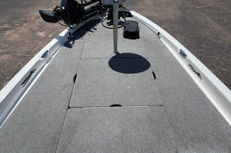 Slide: The Image of 2008 Skeeter SX190 boat deck with gray carpeting and mounted equipment. - 18