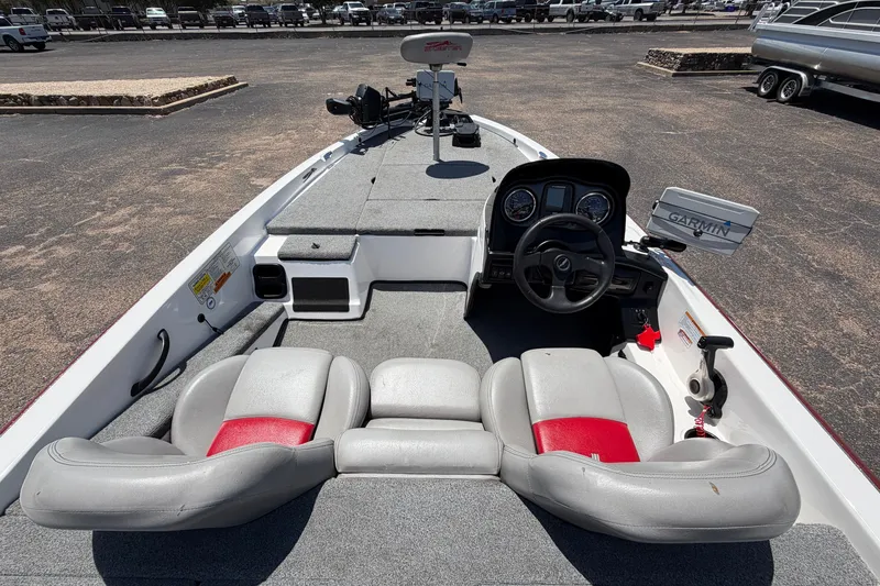 Slide: The Image of 2008 Skeeter SX190 boat interior with steering wheel and Garmin navigation system. - 34