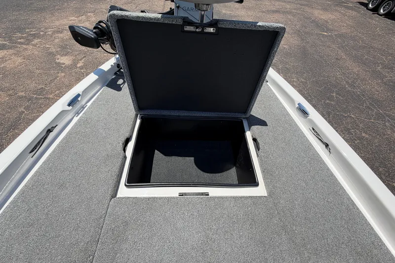 Slide: The Image of Open storage compartment on 2008 Skeeter SX190 boat deck. - 19