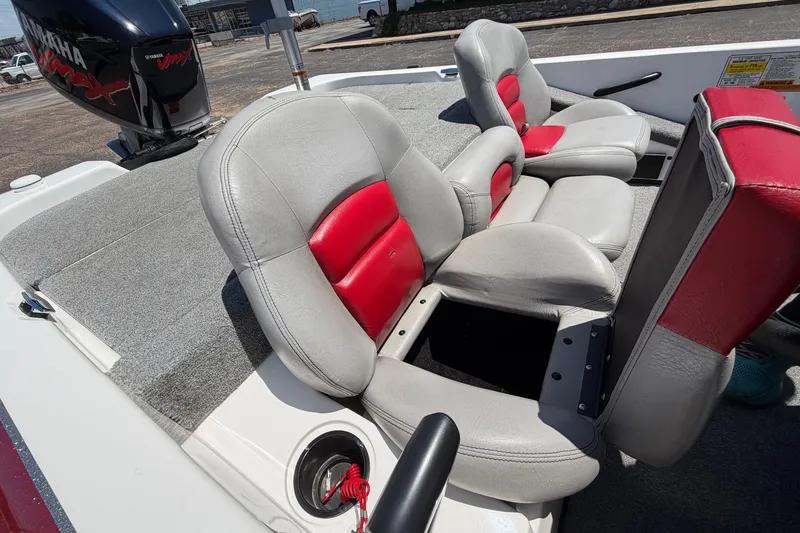 Slide: The Image of 2008 Skeeter SX190 boat interior with gray and red seating, Yamaha VMAX engine visible. - 33