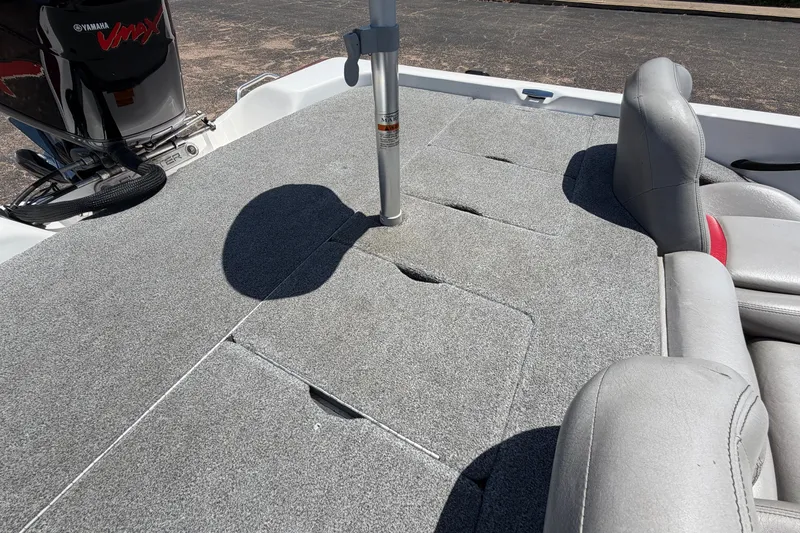 Slide: The Image of 2008 Skeeter SX190 boat deck with Yamaha VMAX engine, featuring gray carpet and seating. - 42