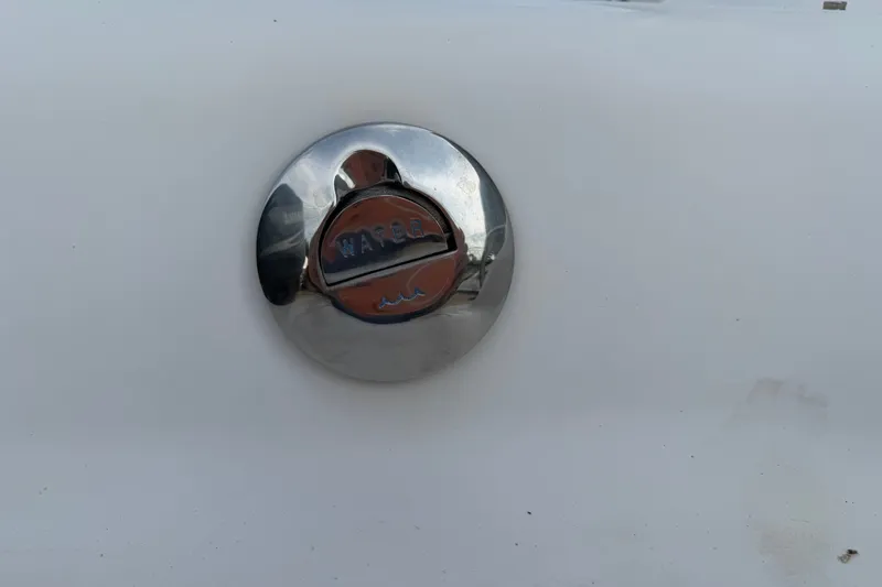 Slide: The Image of Water cap on 2011 Hurricane SunDeck 237 OB boat, chrome finish. - 8
