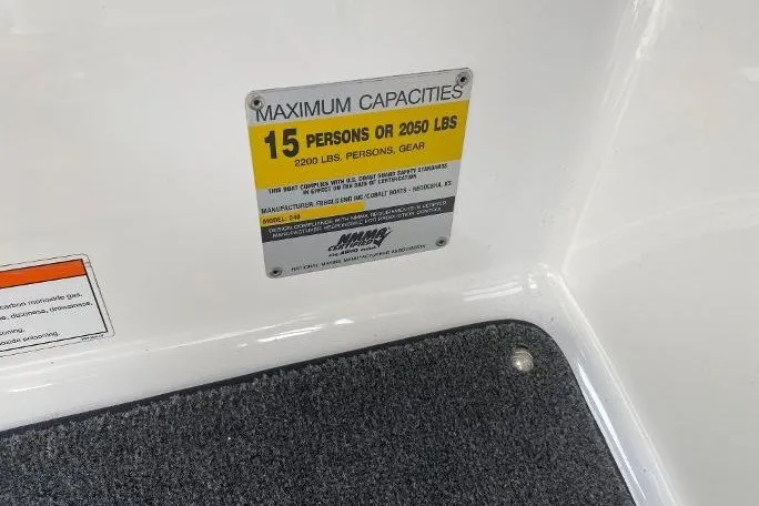 Slide: The Image of 2007 Cobalt 240 capacity plate showing maximum 15 persons or 2050 lbs limit. - 15