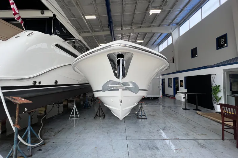 Slide: The Image of 2019 Boston Whaler 280 Outrage boat in indoor storage facility. - 4