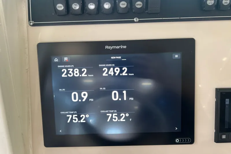 Slide: The Image of Raymarine display on 2019 Boston Whaler 280 Outrage showing engine hours and temperatures. - 14