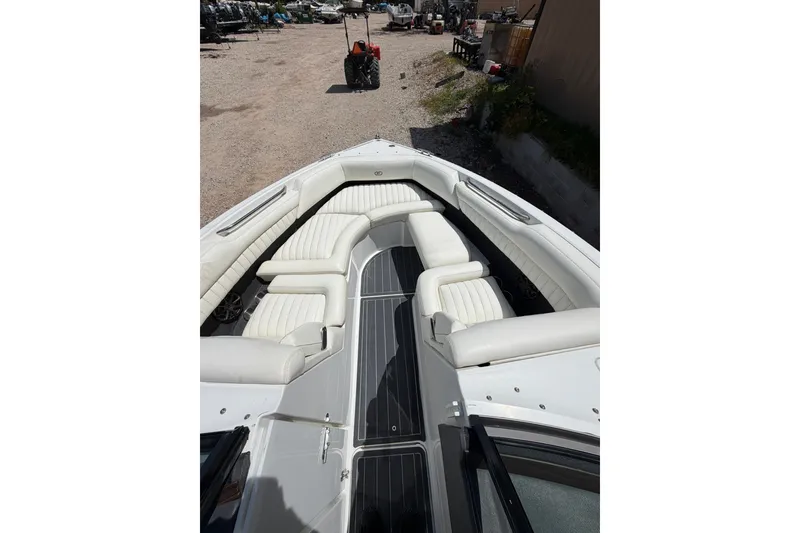 Slide: The Image of 2013 Cobalt R5 boat with white leather seating and sleek design. - 3