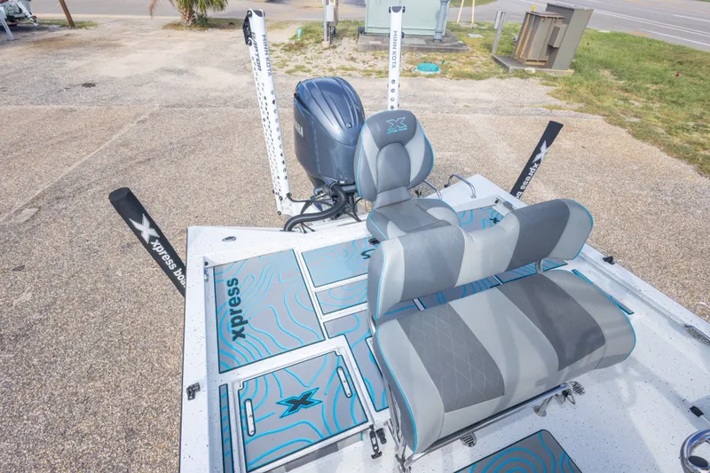 Slide: The Image of 2024 Xpress H22 Bay boat with stylish seating and modern design features. - 42