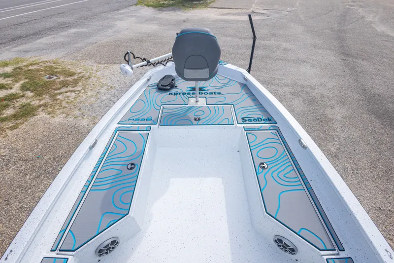 Slide: The Image of 2024 Xpress H22 Bay boat deck with SeaDek flooring and seating. - 30