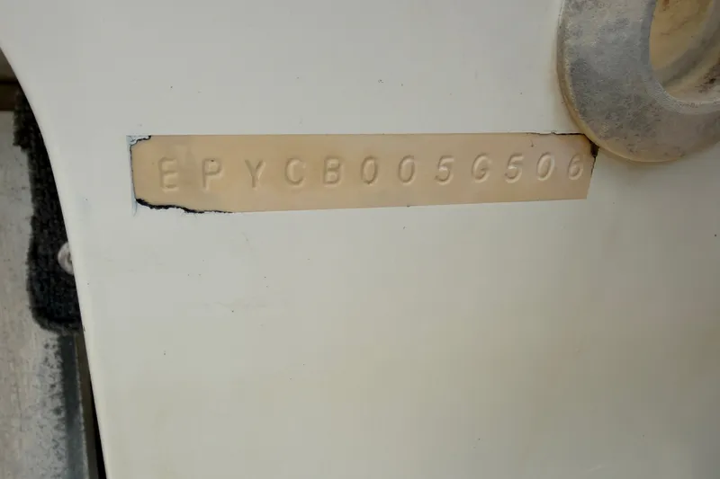 Slide: The Image of Hull identification number on 2006 World Cat 270 TE boat. - 58