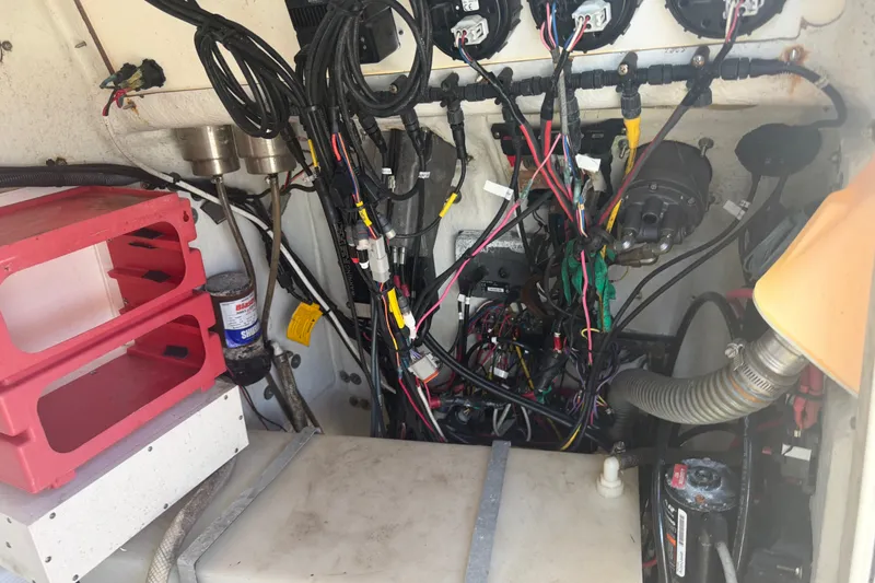 Slide: The Image of Engine compartment of a 2006 World Cat 270 TE, showcasing wiring and components. - 27