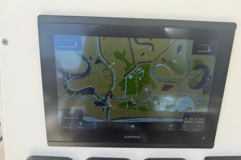Slide: The Image of Garmin GPS display on 2006 World Cat 270 TE boat, showing detailed waterway map. - 31