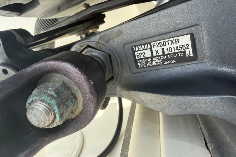 Slide: The Image of Close-up of Yamaha F250TXR engine part on 2006 World Cat 270 TE boat. - 59