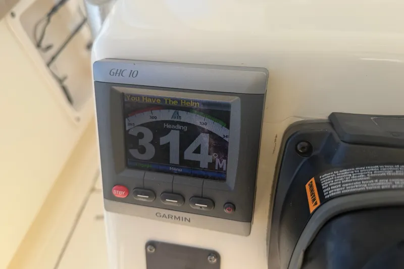 Slide: The Image of Garmin GHC 10 marine display on 2006 World Cat 270 TE boat dashboard. - 39