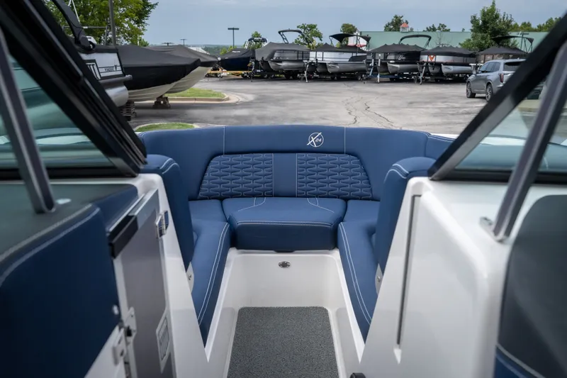 Slide: The Image of Interior view of 2021 MasterCraft X24 boat with blue seating. - 33