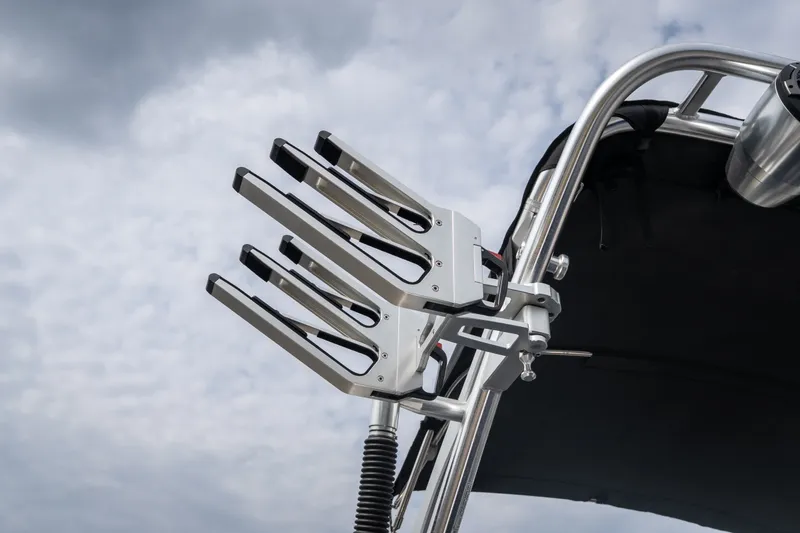 Slide: The Image of Wakeboard rack on 2021 MasterCraft X24 boat against cloudy sky. - 19