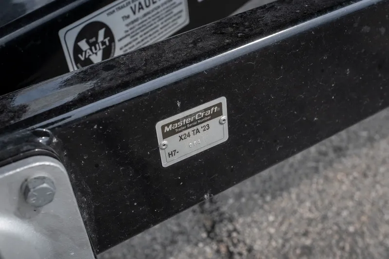 Slide: The Image of Close-up of a 2021 MasterCraft X24 trailer serial number plate. - 13